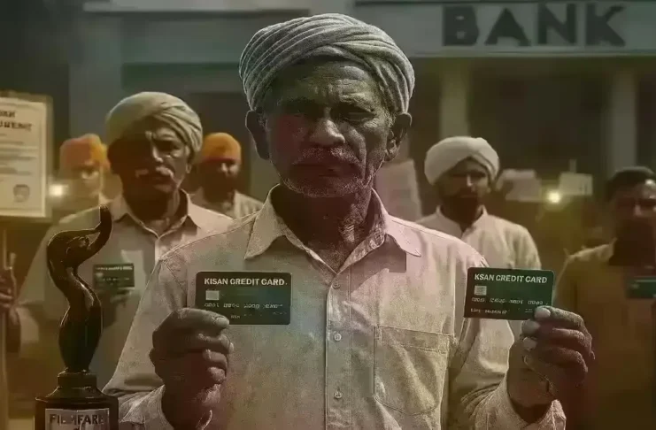 Farmers holding Kisan Credit Cards in front of a bank during loan recovery awareness
